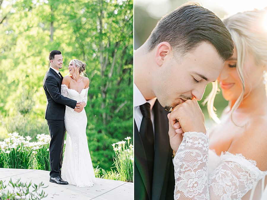 kiss on hand during wedding portraits