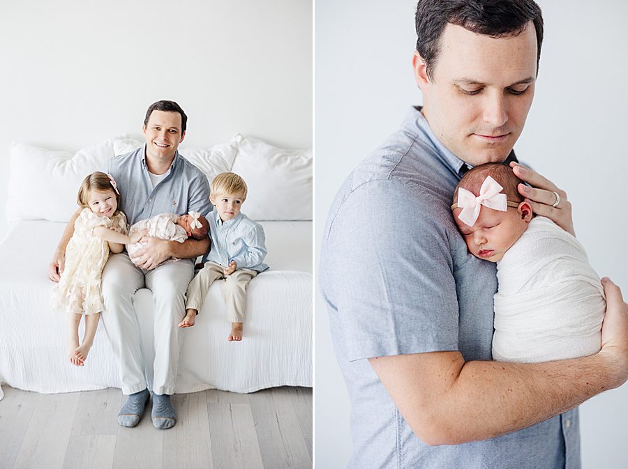 dad holding new daughter