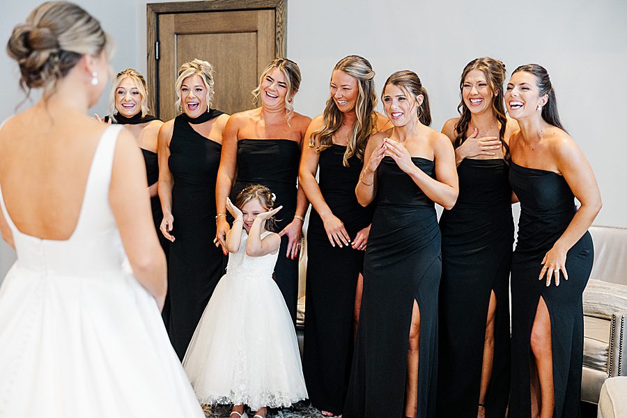 bridesmaids first look before summer press room wedding