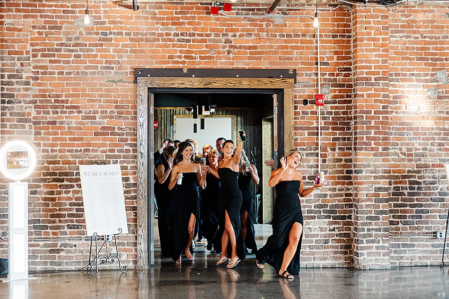 grand entrance to summer press room wedding