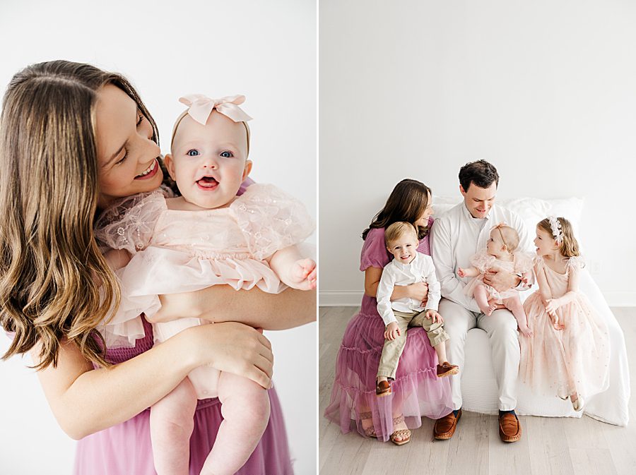 mom holding daughter at white room 6 month session