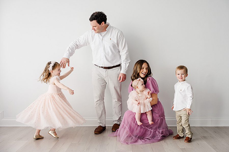 dad twirling daughter