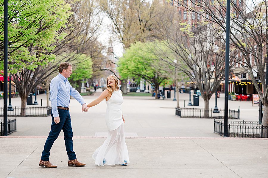 holding hands at spring downtown knoxville engagement