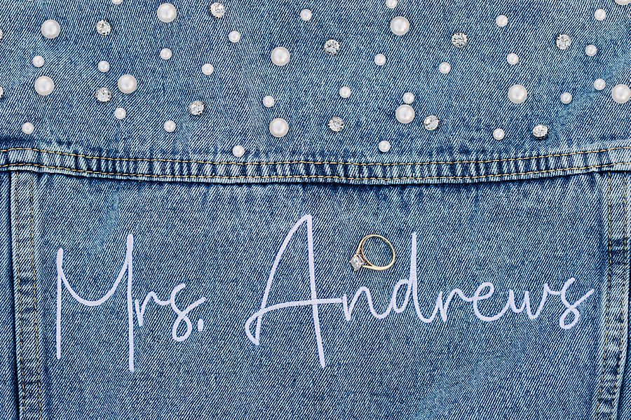 engagement ring on personalized denim jacket