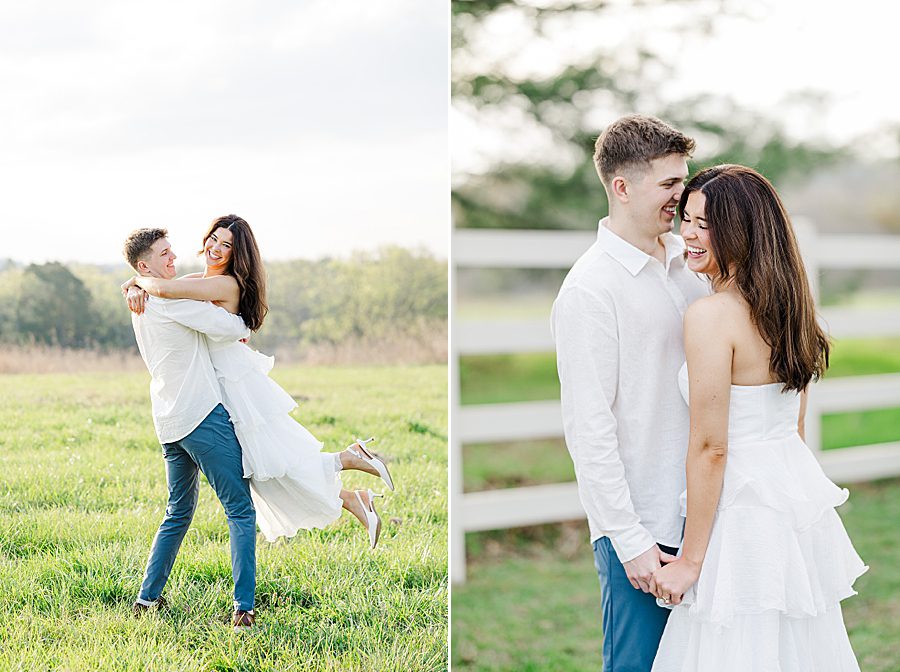couple standing by white picket fence