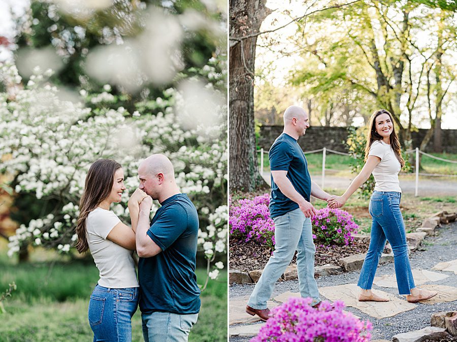 kiss on hands at spring engagement at knoxville botanical