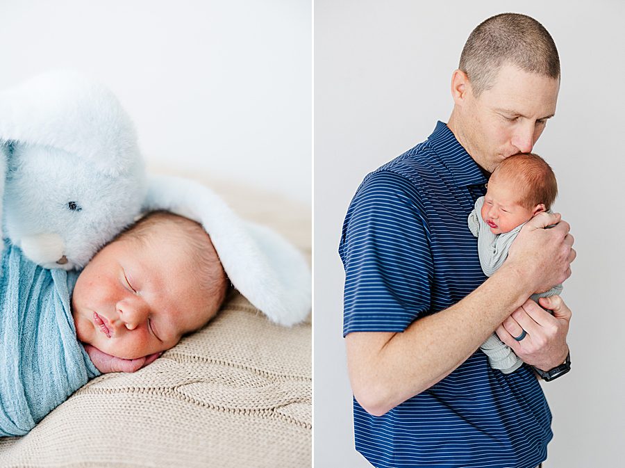 dad kissing newborn son on head