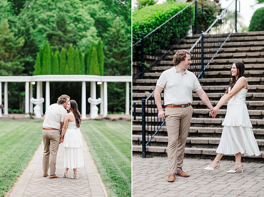couple standing in front of stairs