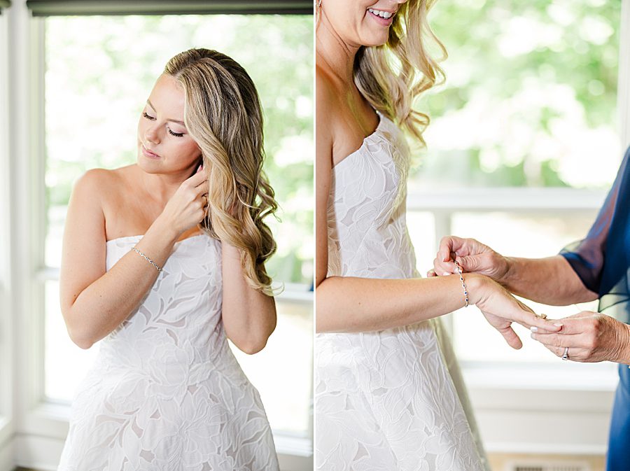 bride putting on earrings before dancing bear wedding
