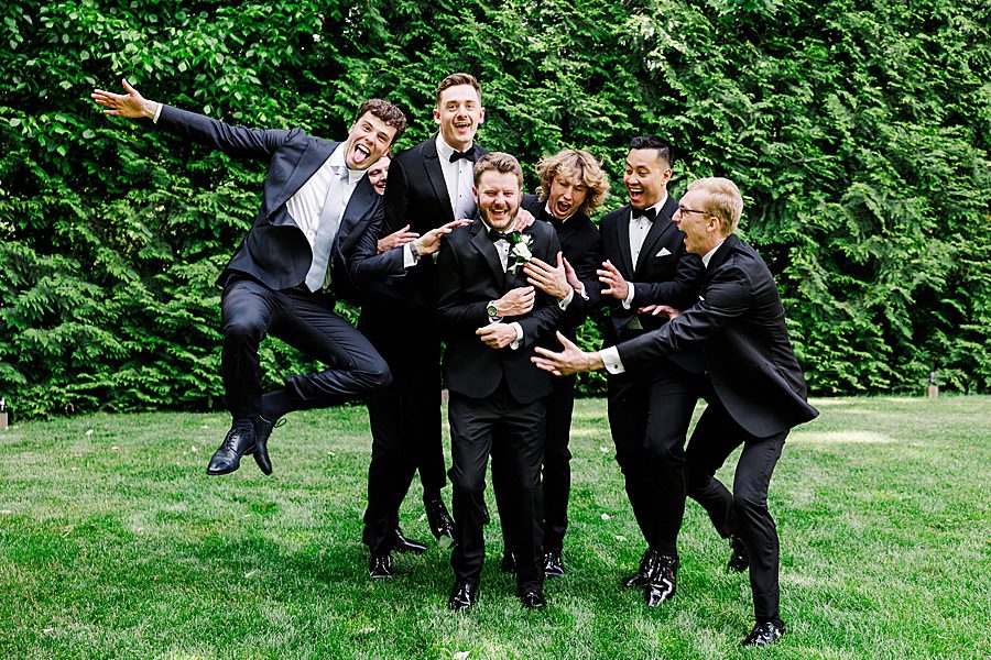groom and groomsmen at dancing bear wedding