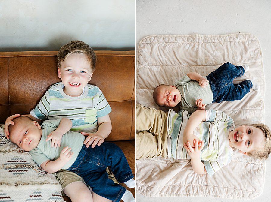 big brother holding baby brother