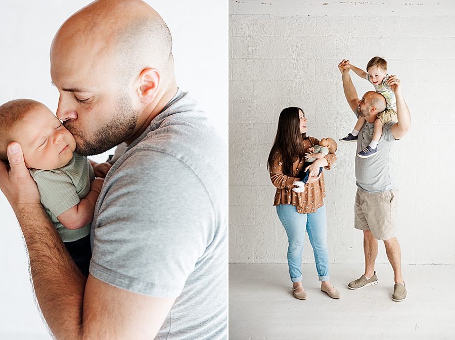 dad holding new son