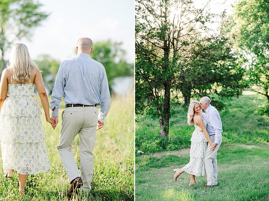 couple holding hands in field at marblegate engagement