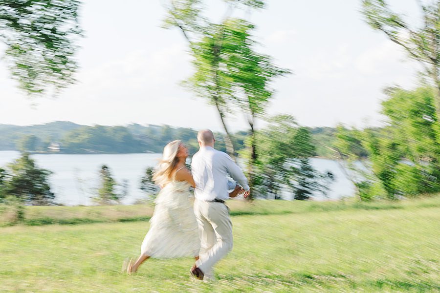 blurred photo of couple playing during marblegate engagement