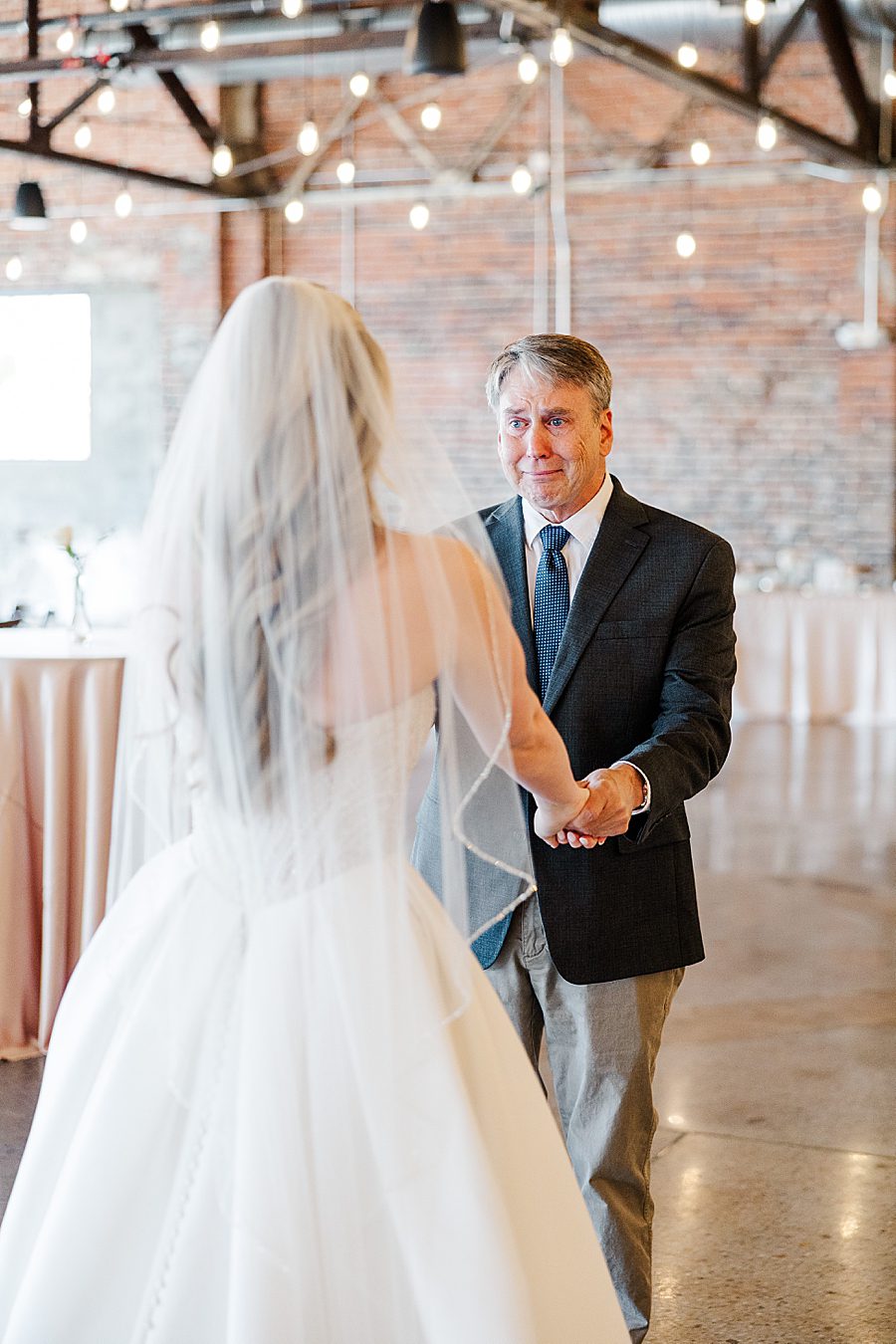 dad first look at press room catholic wedding