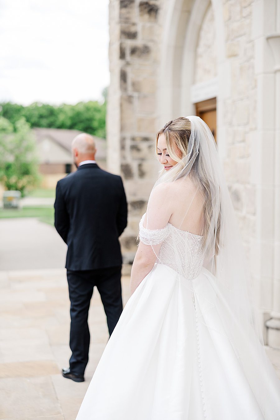 first look at press room catholic wedding