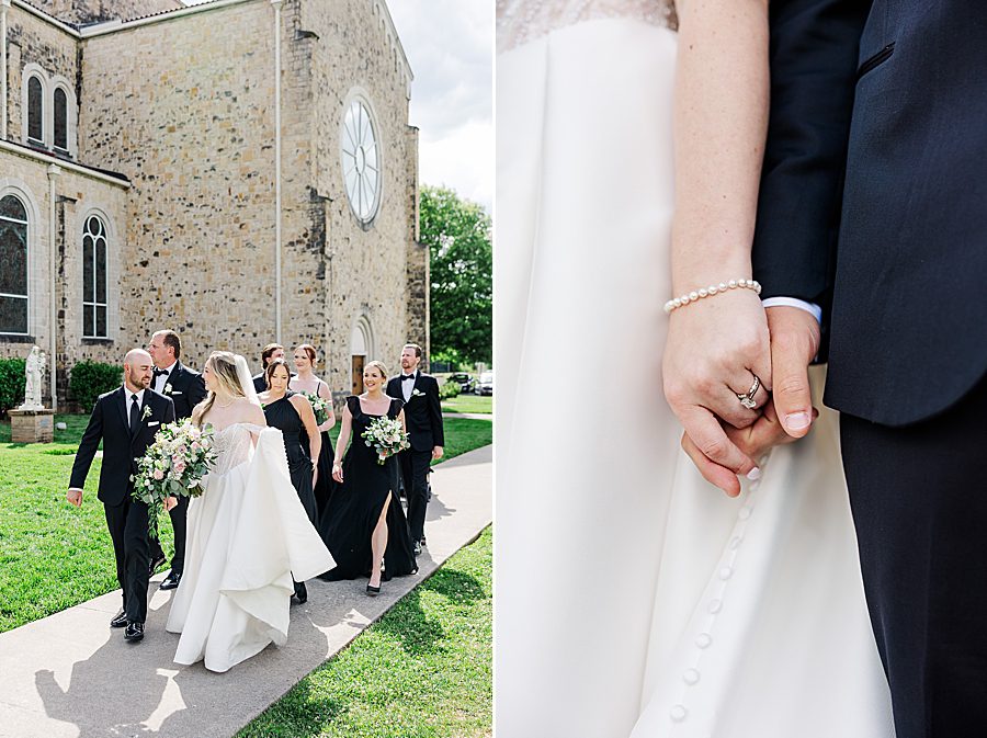 holding hands at press room catholic wedding