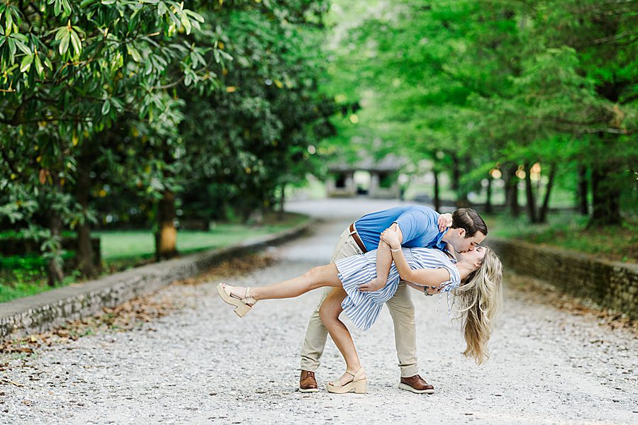 dip kiss at spring engagement at knoxville botanical