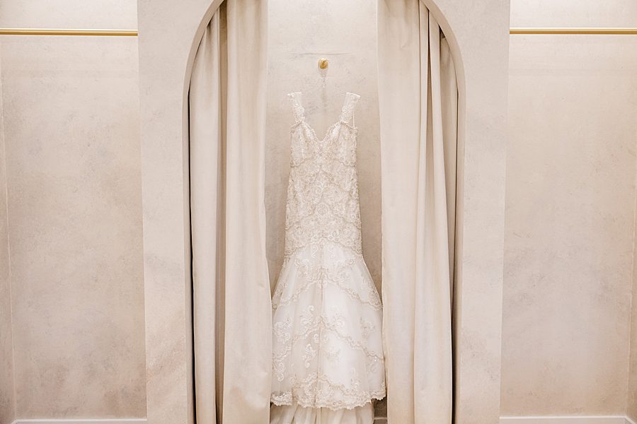 white dress on hanger in closet for trailhead venues wedding