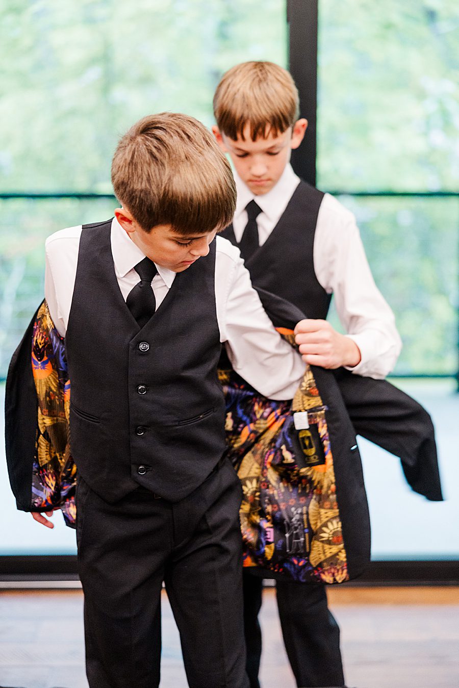 brothers getting ready for trailhead venues wedding