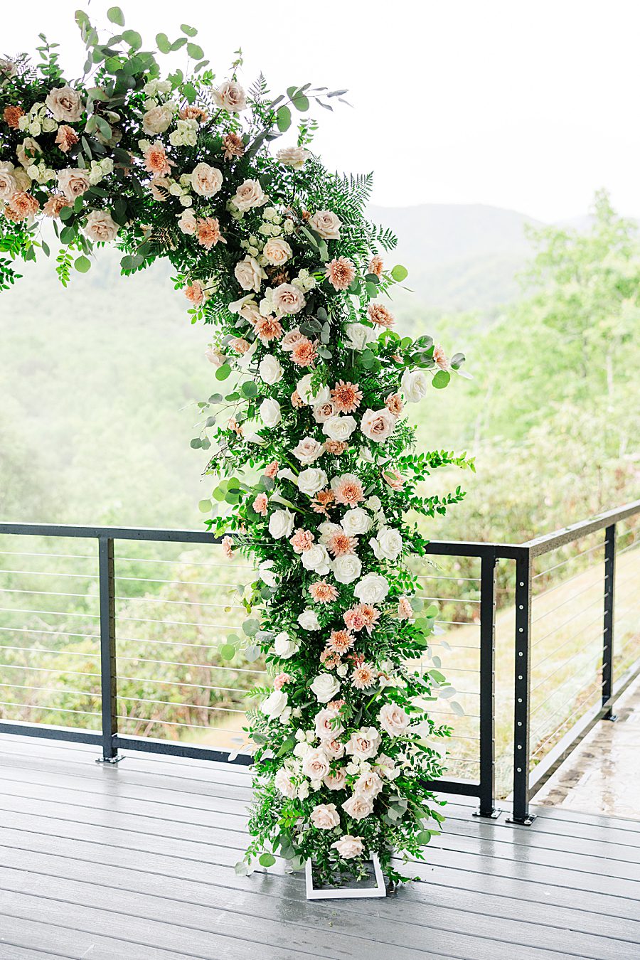 floral arch at trailheads venue wedding