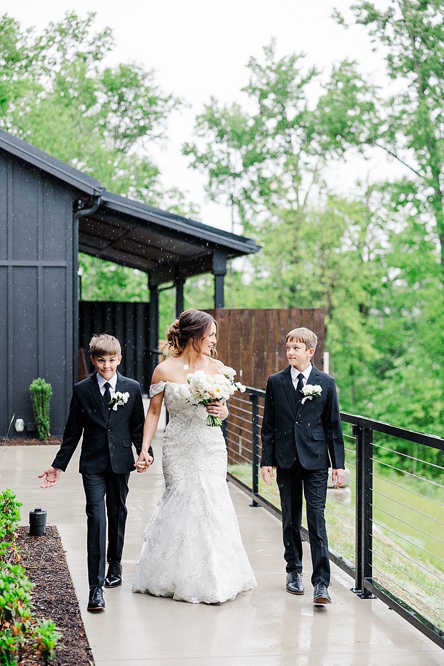 sons walking mom down aisle for trailhead venues wedding