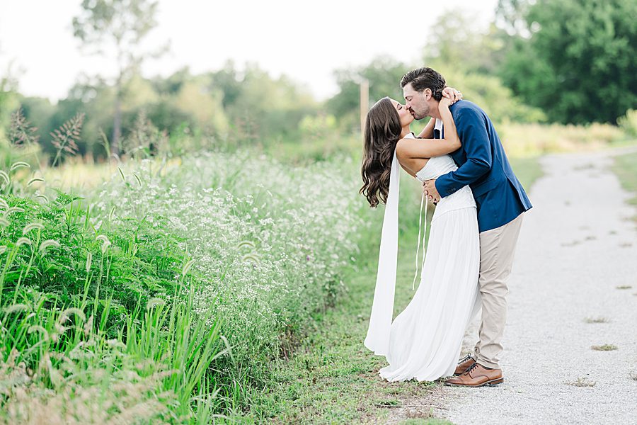 light and airy photo of couple at garden engagement session
