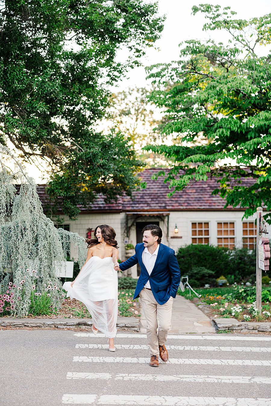 couple running across street