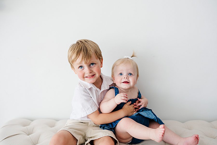 siblings at white room one year session