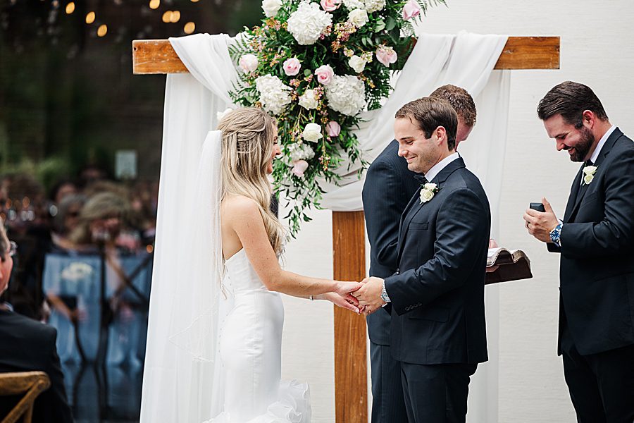 exchanging vows at summer press room wedding