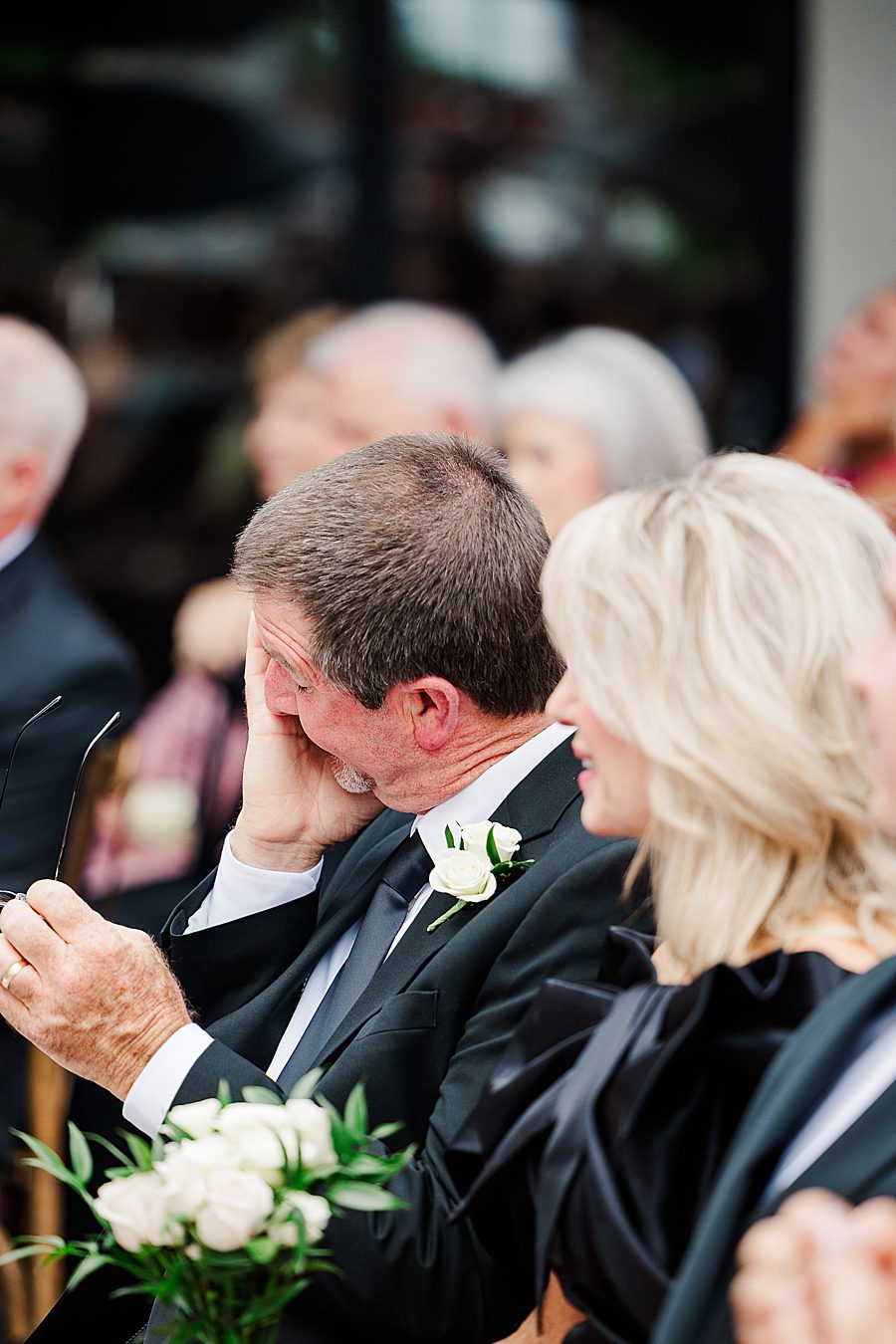 emotional dad at summer press room wedding