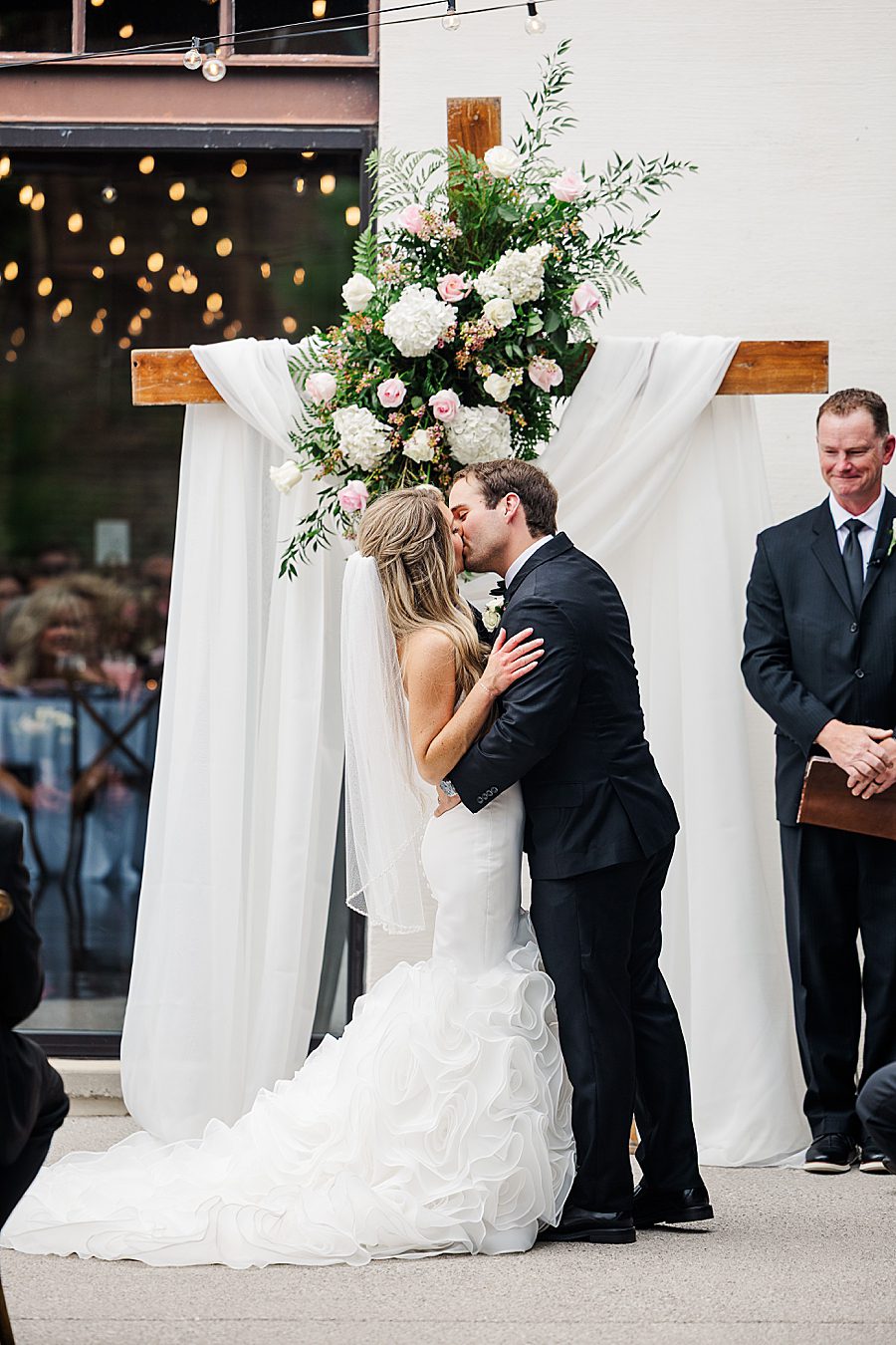 you may kiss the bride at summer press room wedding
