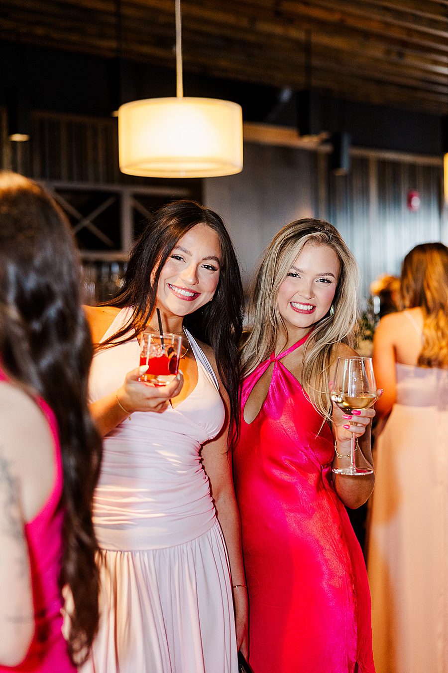 guests at cocktail hour for summer press room wedding
