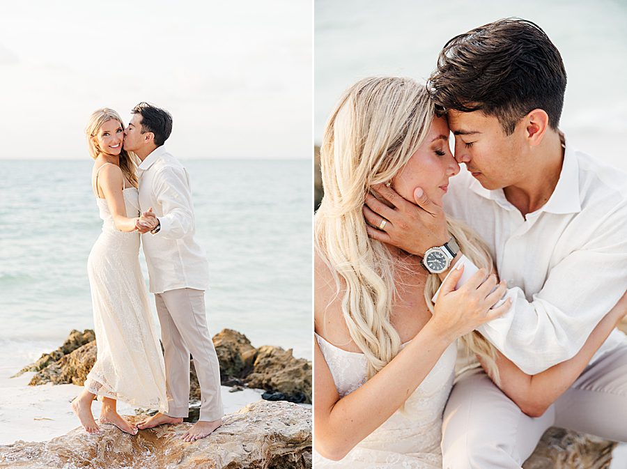 man kissing woman's cheek on beach