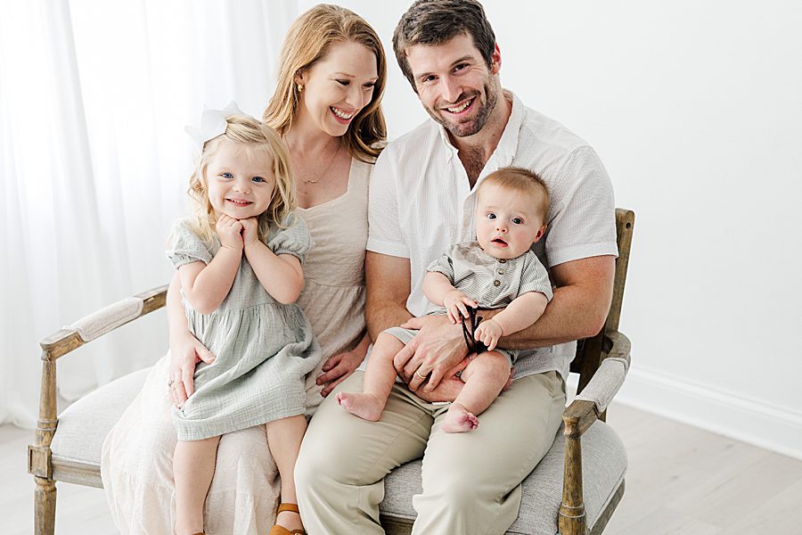 happy family at white room family session