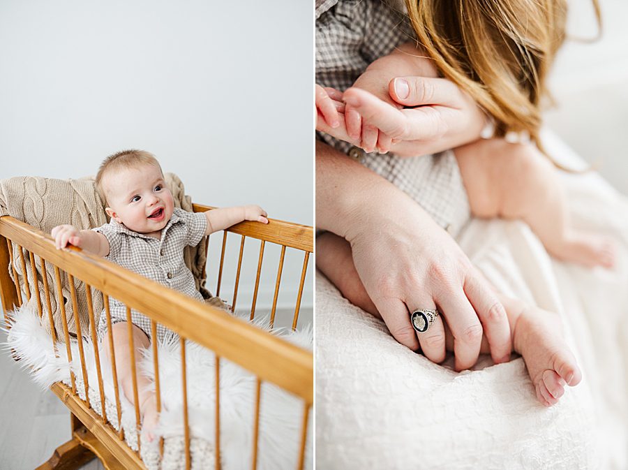 baby in wooden crib
