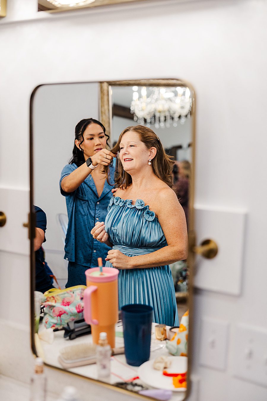 mother of bride getting ready for wildflower event center wedding