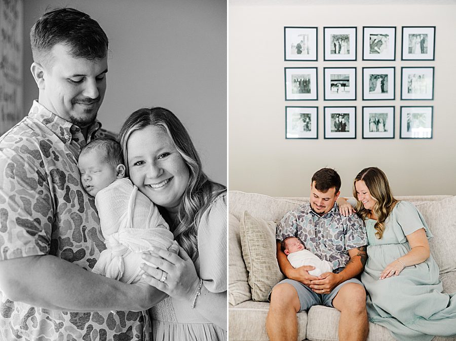 mom and dad holding son on couch at home newborn session