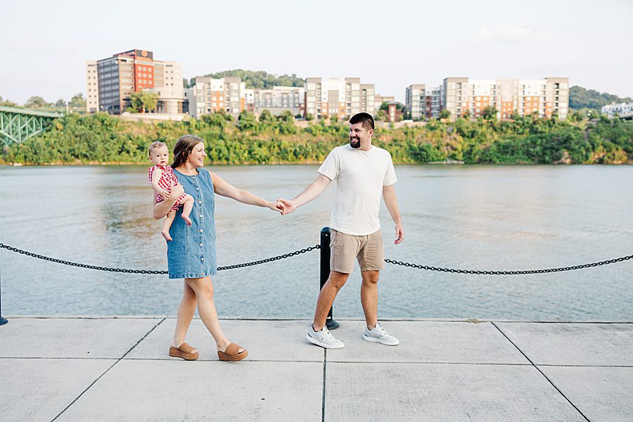 family walking by tennessee river