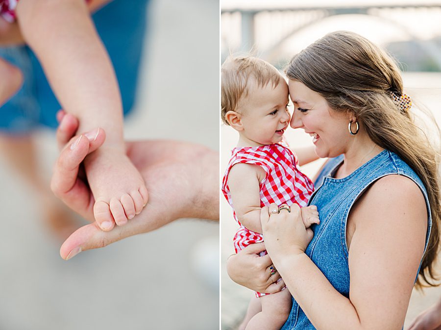 mom holding son in red gingham overalls