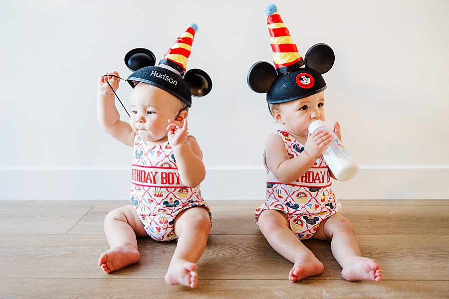 twins wearing birthday mickey ears