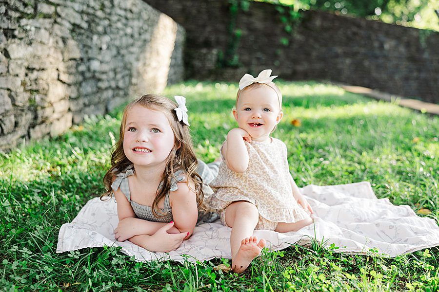 sisters at baby's first year session