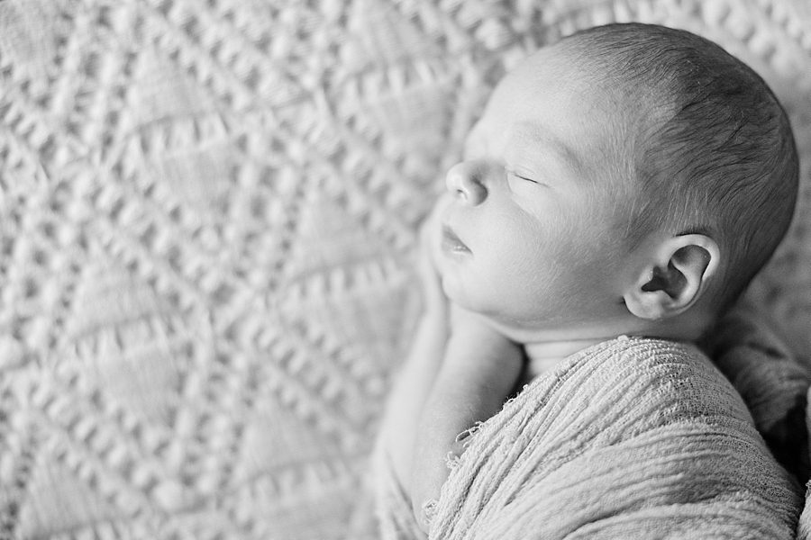 black and white photo of sleeping baby