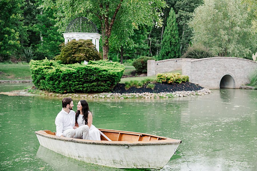 couple sitting in rowboat