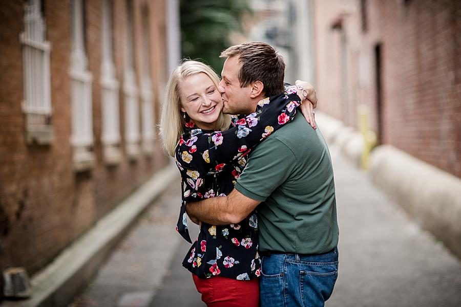 Kiss on the cheek at this Volunteer Landing Engagement Session by Knoxville Wedding Photographer, Amanda May Photos.