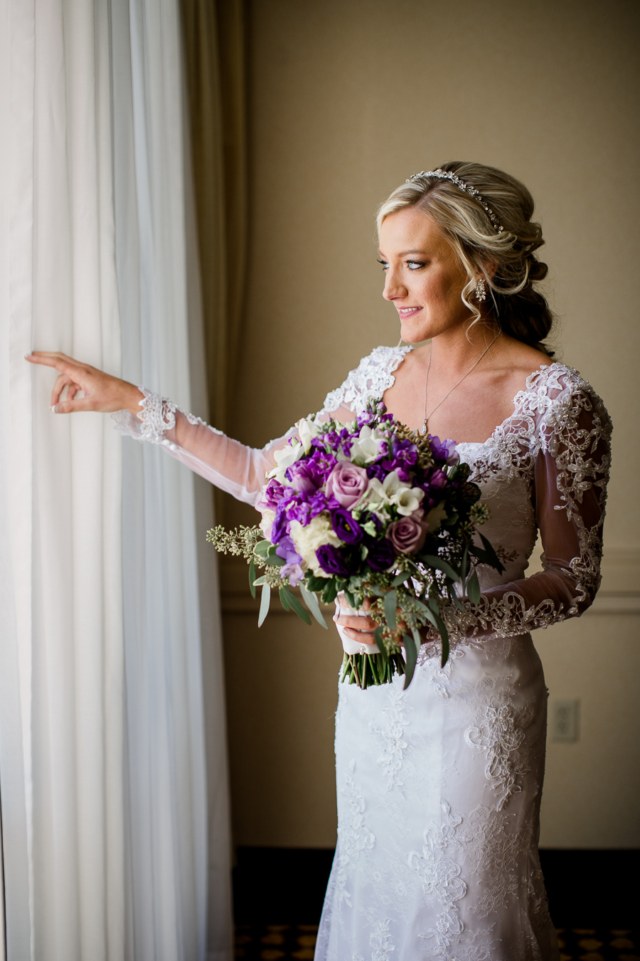 Historic Westwood in Knoxville, TN bride looking out window.