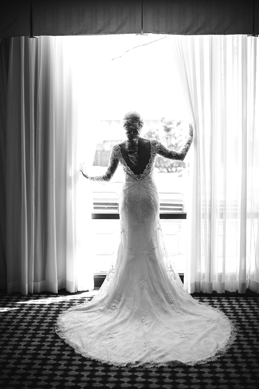 Historic Westwood in Knoxville, TN bride looking out window in black and white.