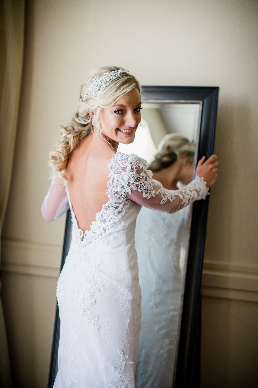 Historic Westwood in Knoxville, TN bride looking back over shoulder from mirror.