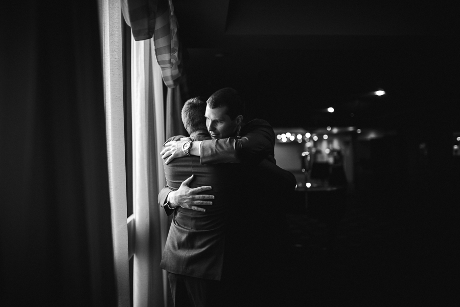 Historic Westwood in Knoxville, TN groom hugging the best man.