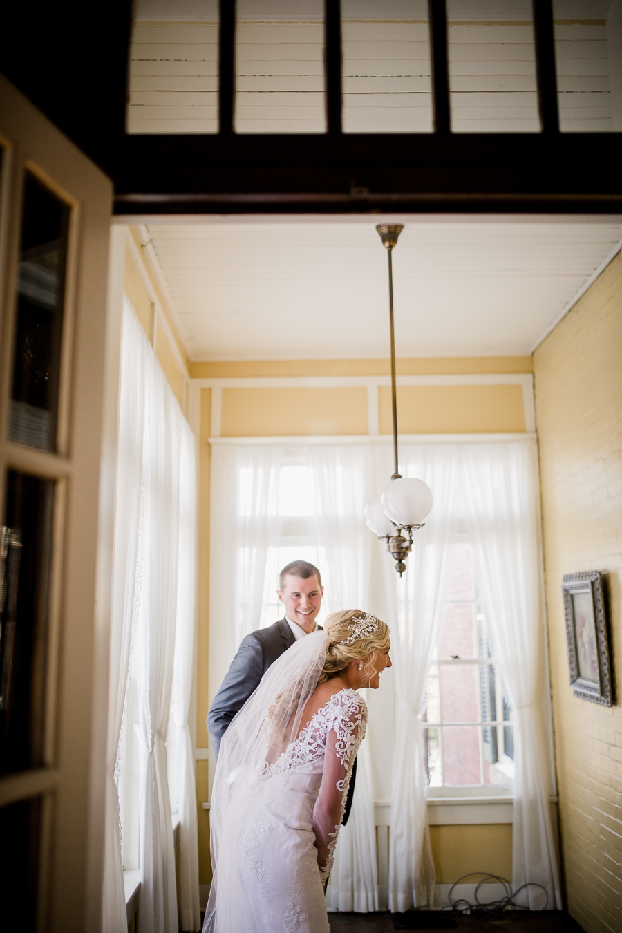 Historic Westwood in Knoxville, TN laughing together during first look.